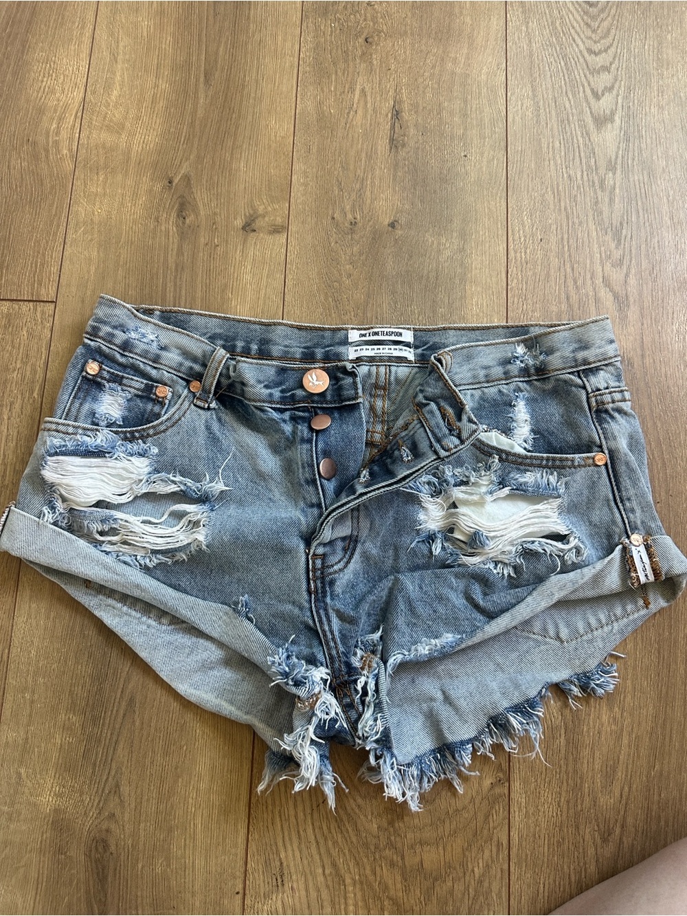 High-Rise Distressed Denim Shorts - Light Blue